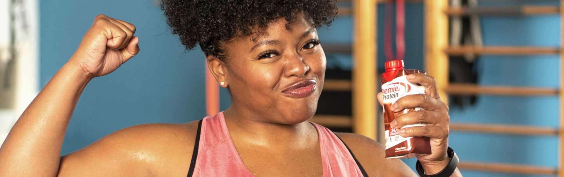 A women flexing her muscles.