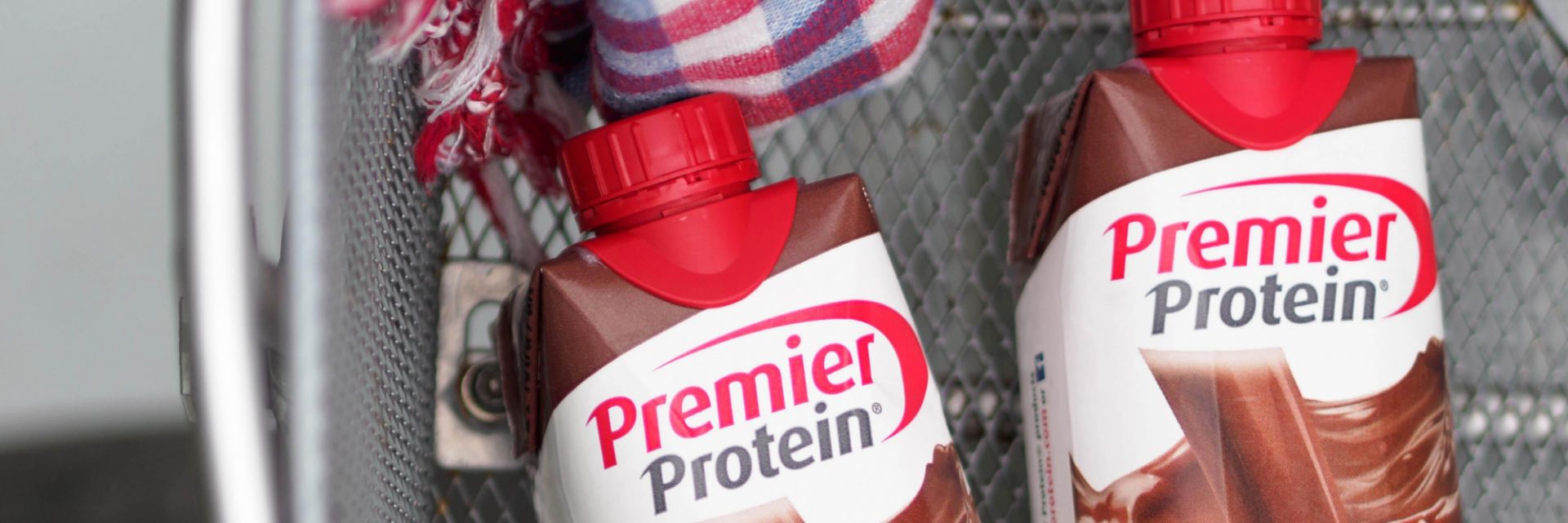 Two Premier Protein shakes in a locker.