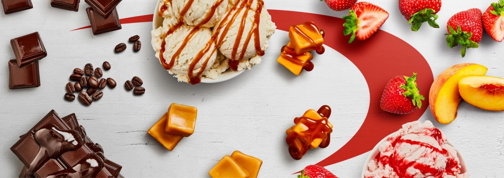 A variety of ice cream, chocolate, caramel and fruit
