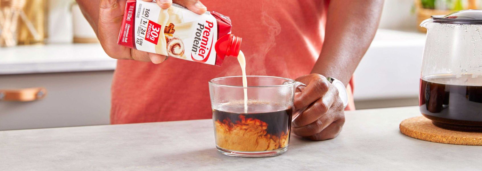 A photo of Premier Protein Cinnamon Roll Protein Shake